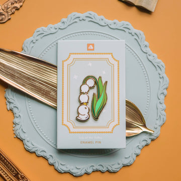 Pin’s émaillé – Caneton Muguet