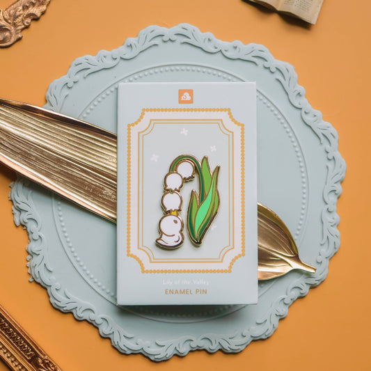 Pin’s émaillé – Caneton Muguet