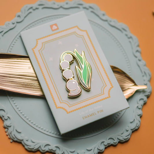 Pin’s émaillé – Caneton Muguet